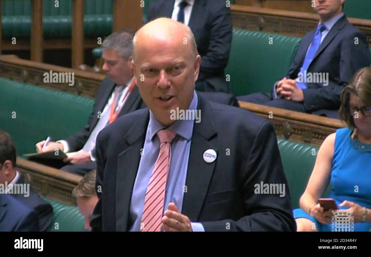 transport Secretary Chris Grayling speaking in the House of Commons today where he has dismissed fears of a bias against northern regions over rail spending. Stock Photo