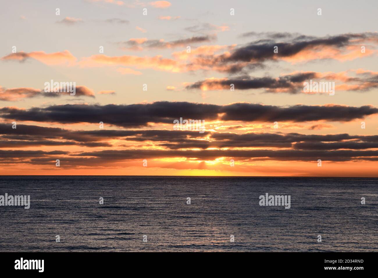 Sea Setting Example The Sun Setting in the Sea Stock Photo - Alamy