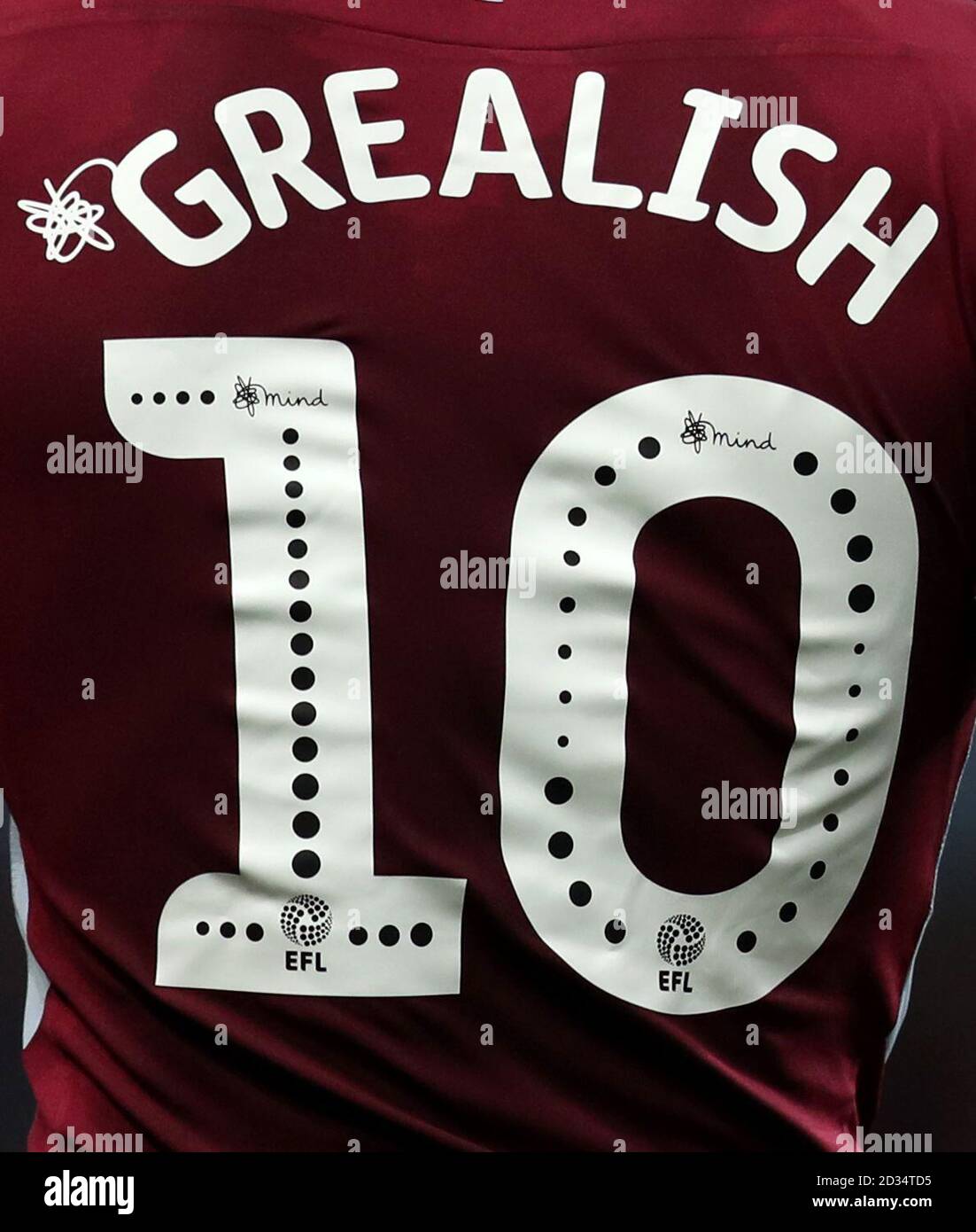 A general view of the Mind Charity detailing on the back of Aston Villa's Jack Grealish's shirt during the Sky Bet Championship match at Villa Park, Birmingham. PRESS ASSOCIATION Photo. Picture date: Tuesday September 18, 2018. See PA story SOCCER Villa. Photo credit should read: Simon Cooper/PA Wire. RESTRICTIONS: EDITORIAL USE ONLY No use with unauthorised audio, video, data, fixture lists, club/league logos or 'live' services. Online in-match use limited to 120 images, no video emulation. No use in betting, games or single club/league/player publications. Stock Photo