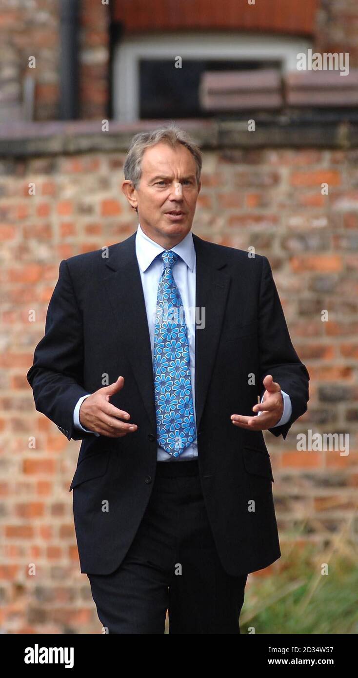 British Prime Minister Tony Blair arrives at the Holly Croft Centre, a children's care home in York. He has embarked on a two-day tour of England which will include a speech on social exclusion - one of his favourite themes, in a bid to defy critics who want him to name the day for stepping down. Stock Photo