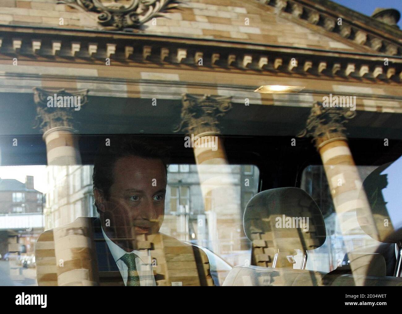 Conservative leader David Cameron outside St Andrews In The Square Church (reflected in glass), after claiming English ignorance of Scotland is damaging the union between the two countries. Stock Photo