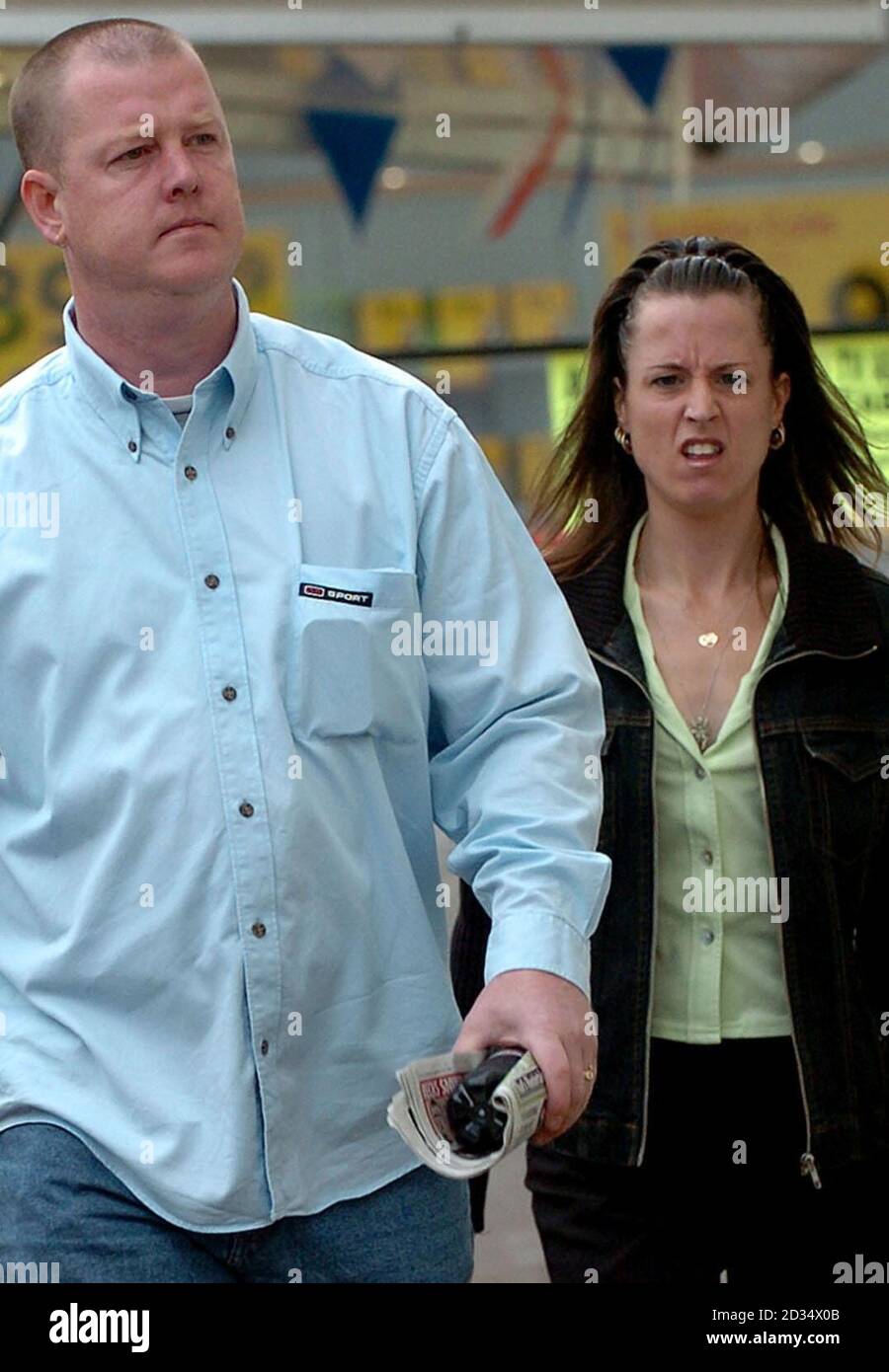 Michael Feehilly, 38, and his partner Toni Badcock, 30 arrive at Huntingdon Magistrates Court, Huntingdon, where Ms Badcock faced charges of being in charge of a dangerously out-of-control dog. PRESS ASSOCIATION Photo Picture date Wednesday September 27 2006. Four year Old George Brown, from Huntingdon underwent four hours of reconstructive surgery at Adeenbrooke's Hospital Cambridge after an attack by an American Bulldog owned by the couple. See PA Story COURTS Bulldog. Photo credit should read Chris Radburn/PA Stock Photo