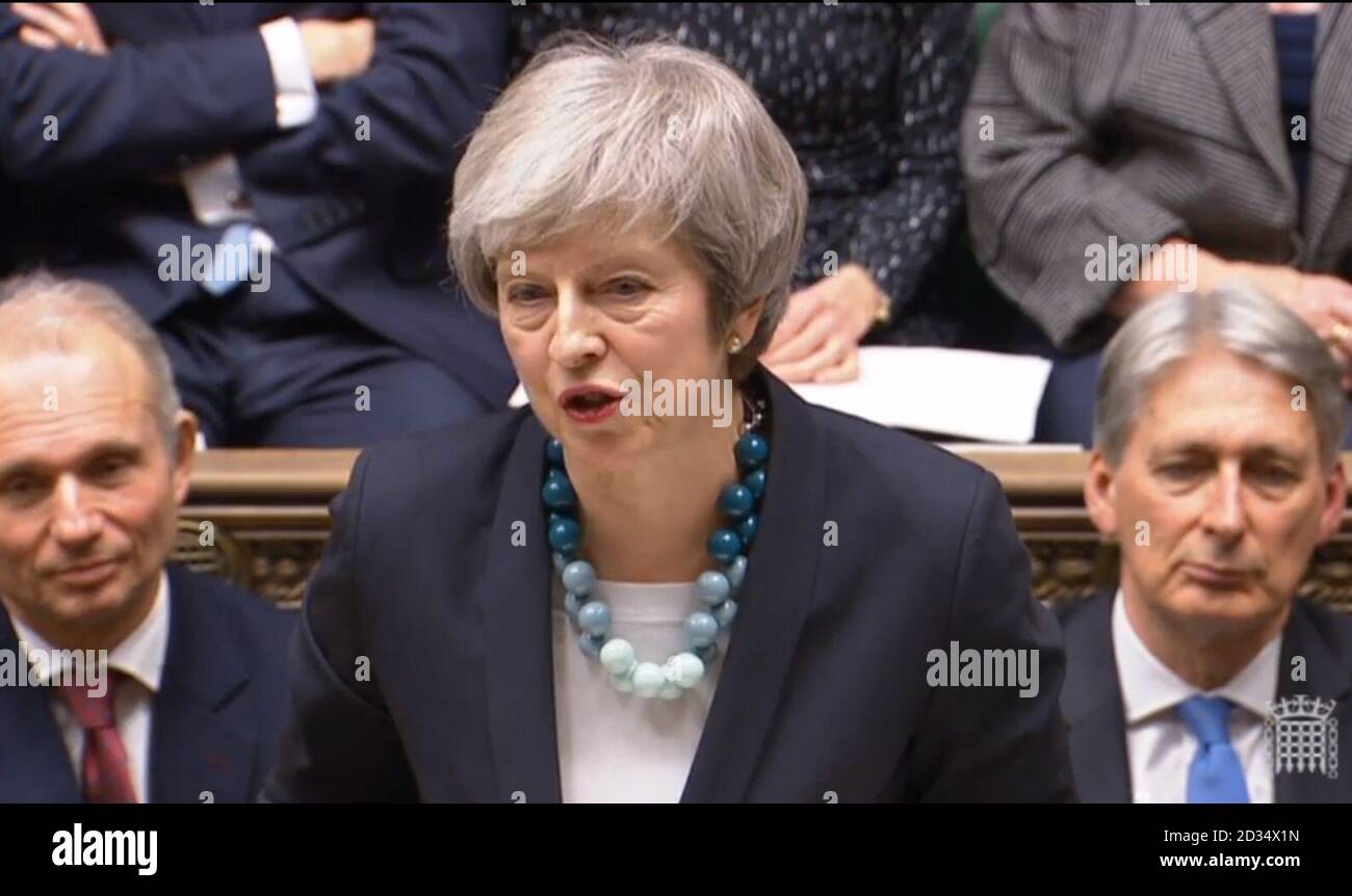 Prime Minister Theresa May making a statement in the House of Commons, London, where she told MPs that tomorrow's 'meaningful vote' on her Brexit deal had been deferred. Stock Photo