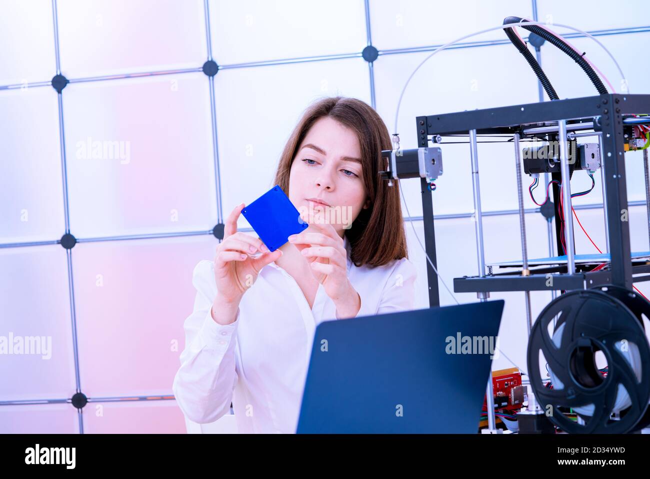 Young women designer in 3d printing lab Stock Photo