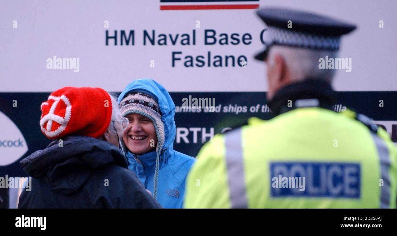 Anti-nuclear protestors take part in a demonstration outside Faslane nuclear base, home to Trident nuclear submarines. Stock Photo