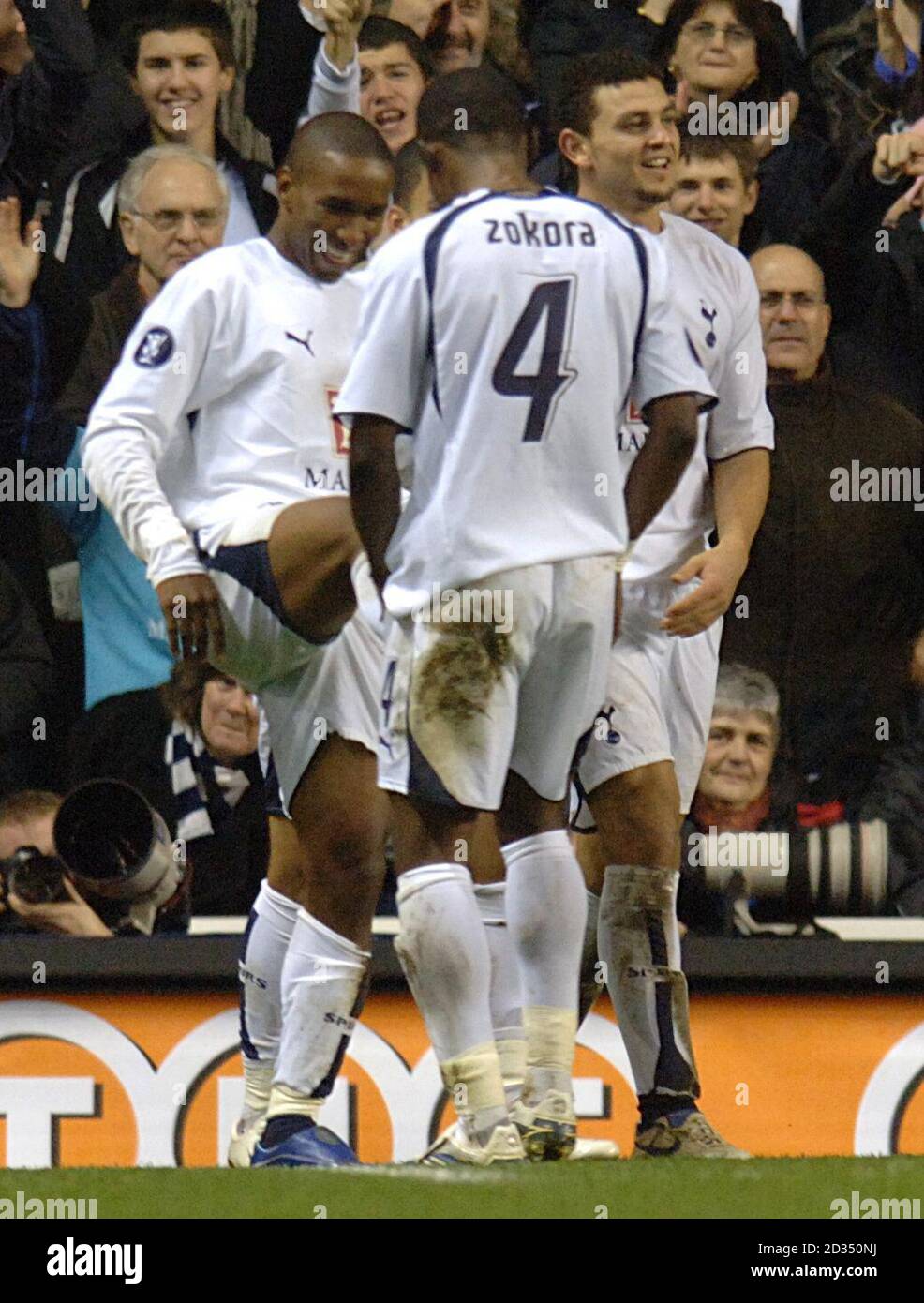 Tottenham Hotspur's Didier Zokora celebrates with goal scorer Jermain Defoe Stock Photo