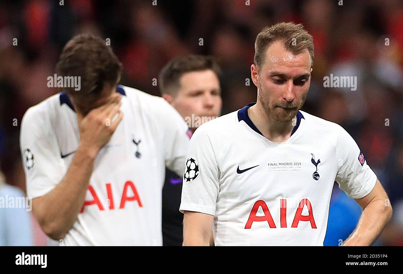 Tottenham Hotspur's Fernando Llorente and Christian Eriksen reacts after the final whistle during the UEFA Champions League Final at the Wanda Metropolitano, Madrid. Stock Photo