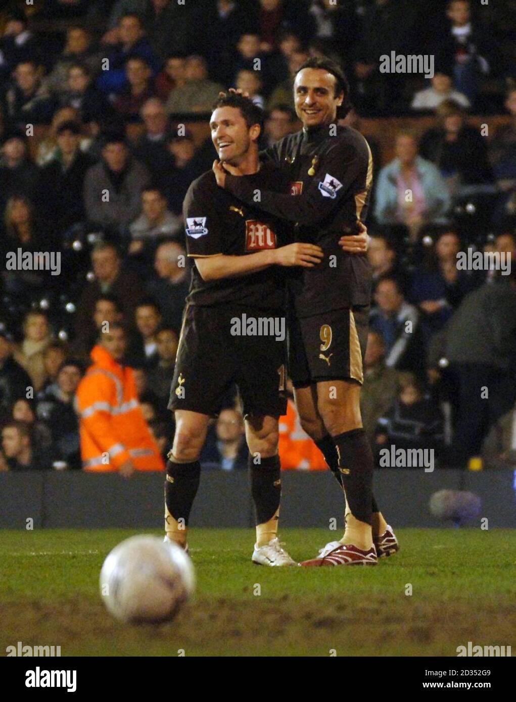 Tottenham Hotspur's double goalscorers Robbie Keane (left) and Dimitar Berbatov celebrate during the FA Cup Fifth Round match against Fulham at Craven Cottage, London, Stock Photo