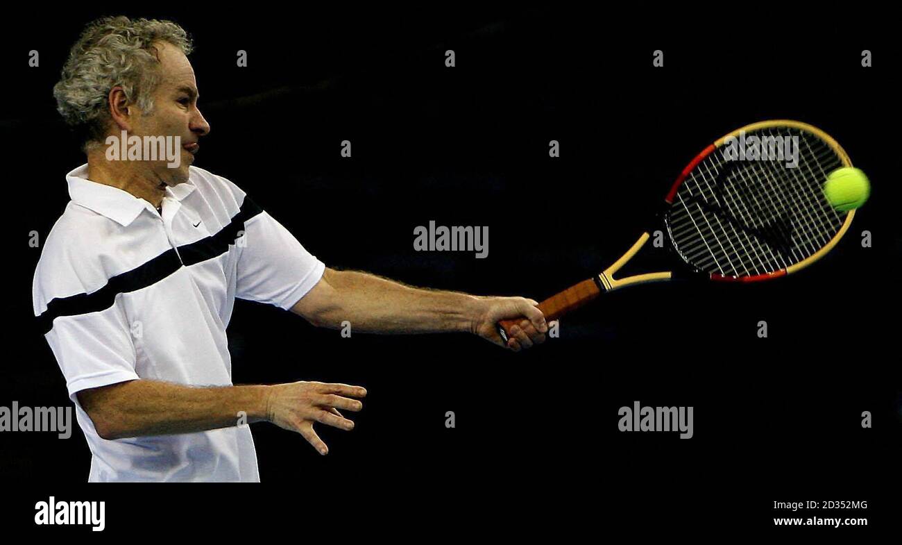 John McEnroe in action against Jeremy Bates during the Tennis Legends tour  at Belfasts Odyssey Arena Stock Photo - Alamy