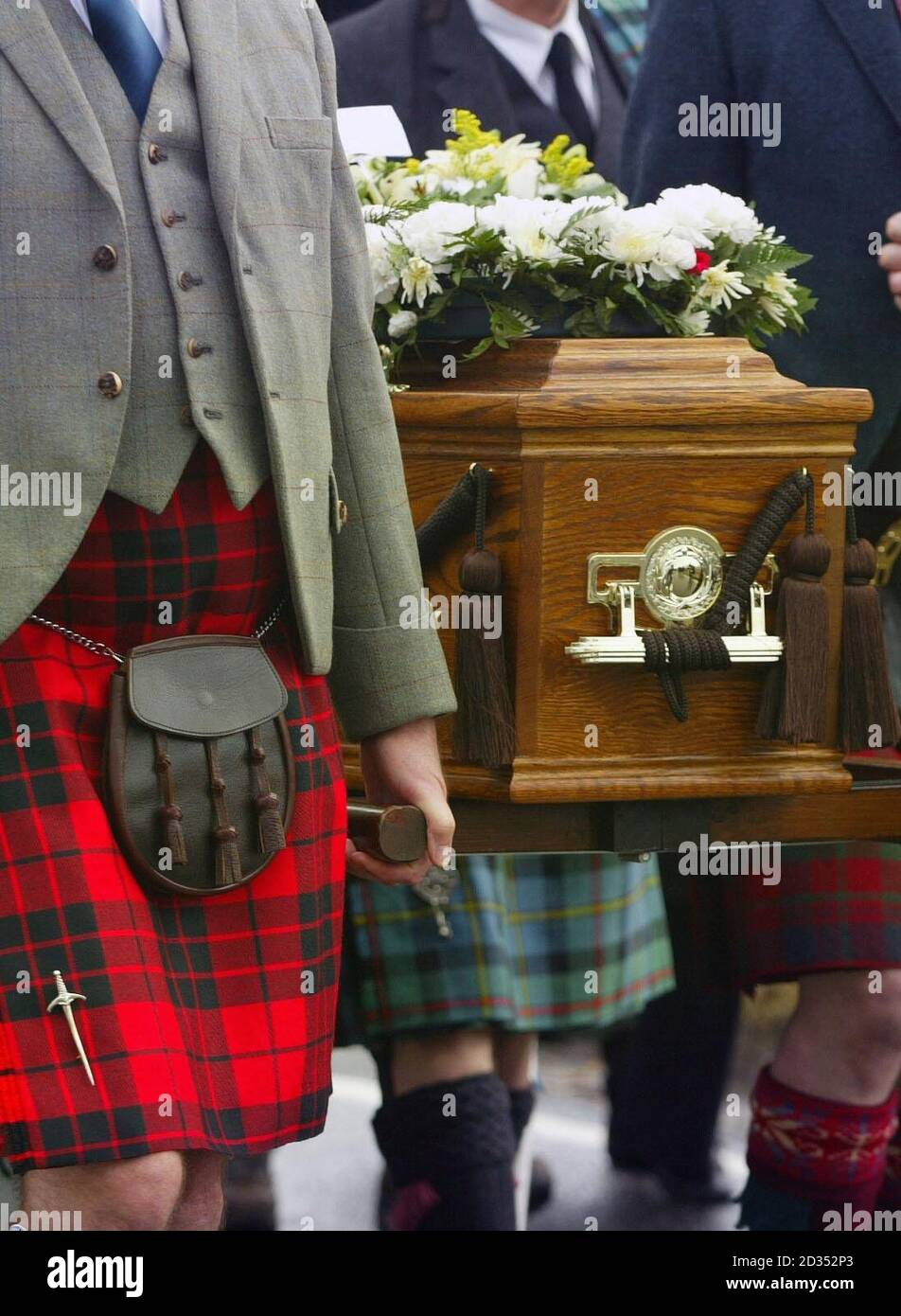 Friends and family attend the funeral of John Macleod of Macleod, 29th Chief of Clan MacLeod, who died on February 12, aged 71. Stock Photo