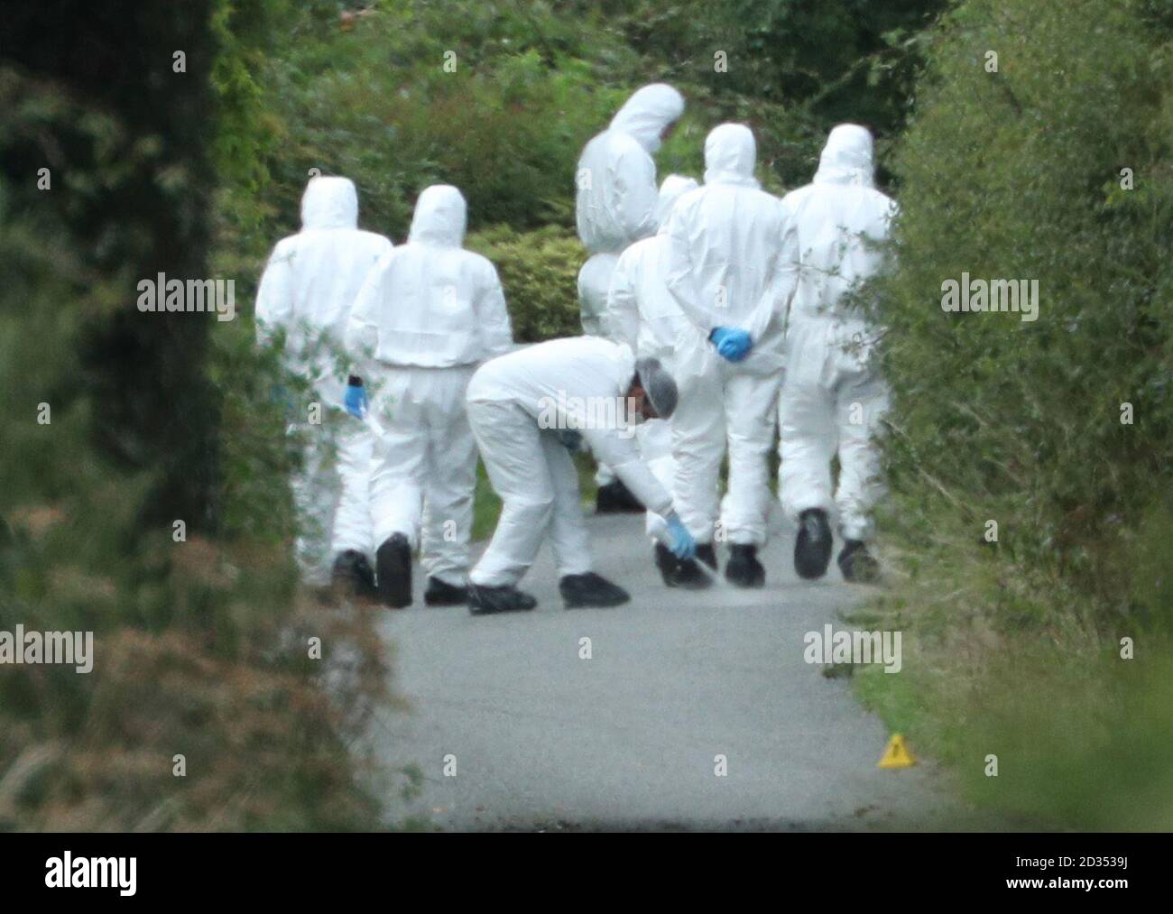 Forensic teams working along Lambdens Hill, near the scene where Thames Valley Police officer Pc Andrew Harper, 28, died following a 'serious incident' at about 11.30pm on Thursday near the A4 Bath Road, between Reading and Newbury, at the village of Sulhamstead in Berkshire. Stock Photo