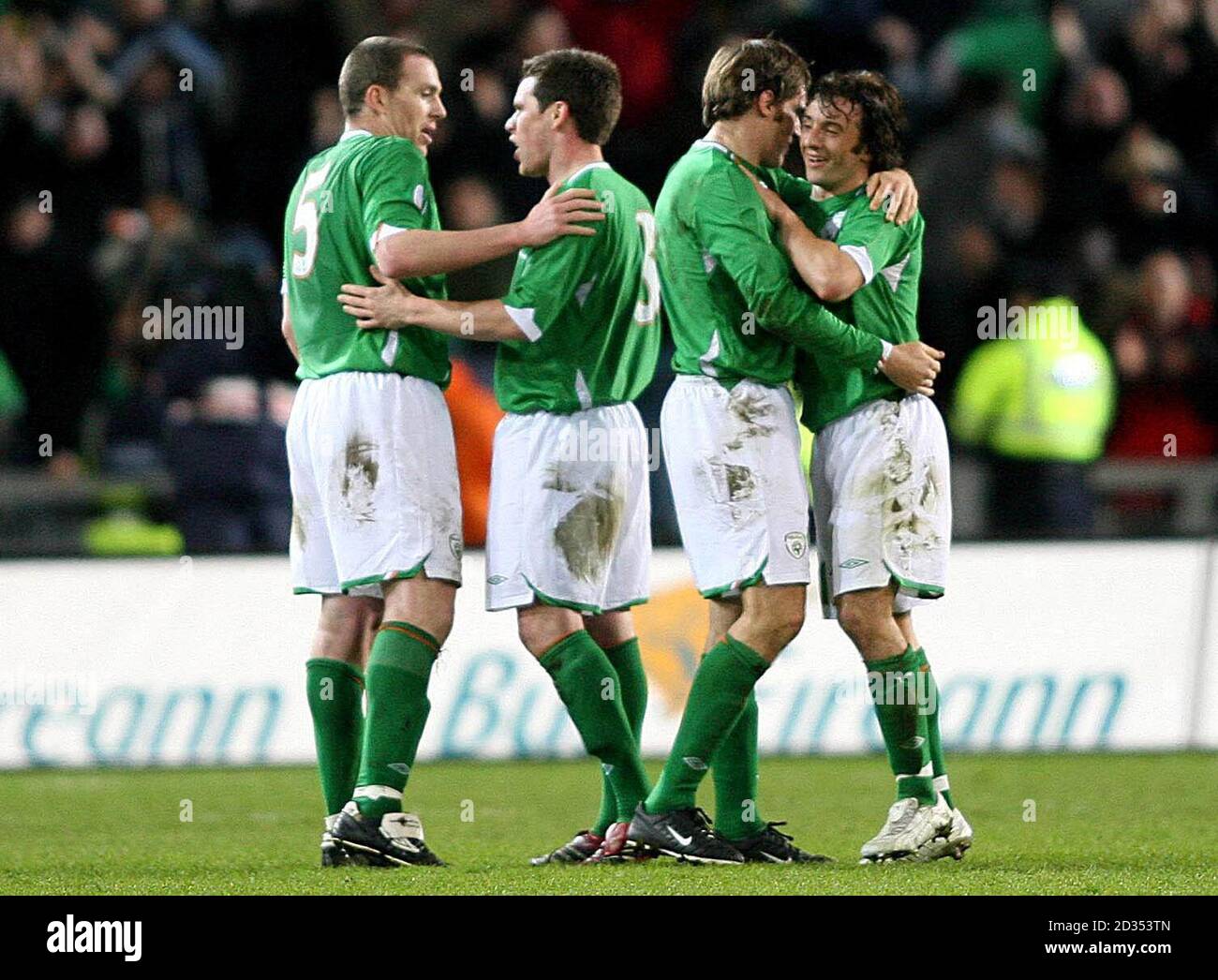 (Left to Right) Republic of Ireland's Richard Dunne, Stephen Finnan, Kevin Kilbane and Stephen Hunt celebrate their victory over Slovakia in the UEFA European Championship Qualifying match at Croke Park, Dublin. Stock Photo