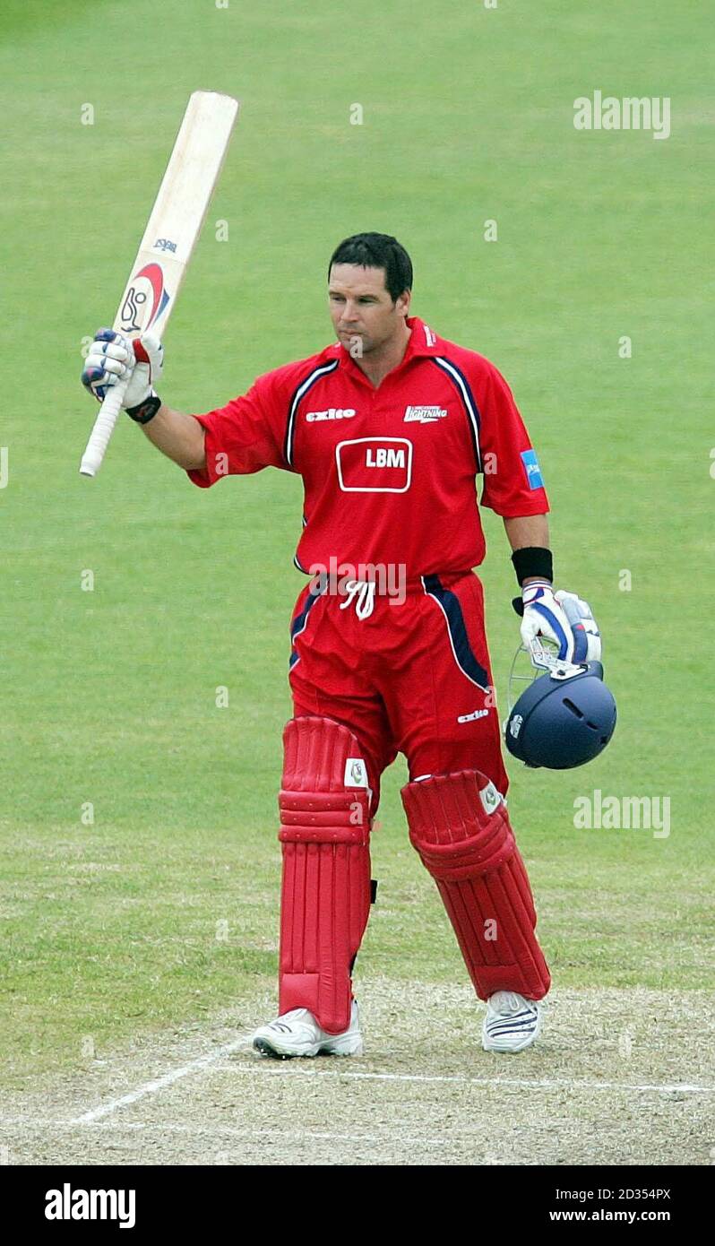 Lancashire's Brad Hodge celebrates making his century during the Friends Provident Trophy