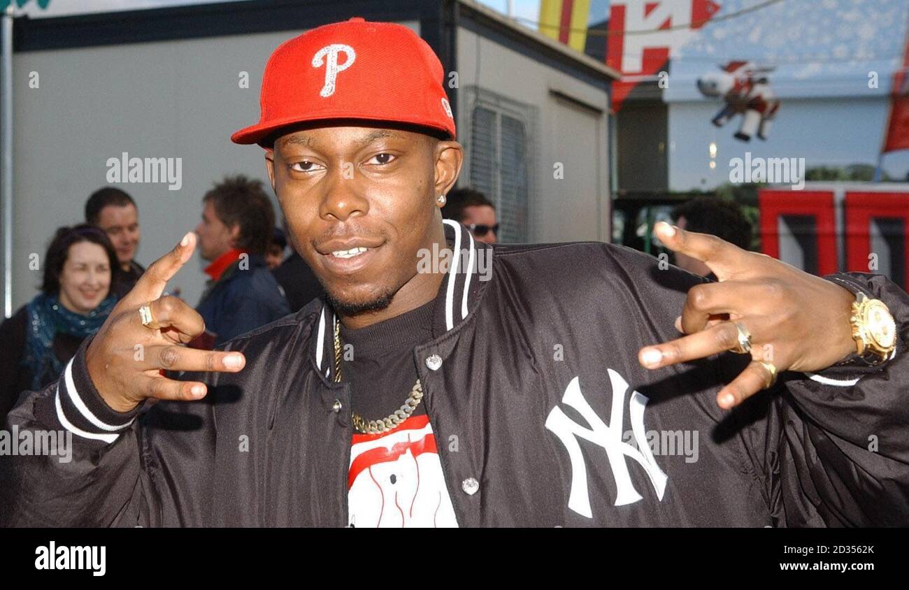 Dizzee Rascal Smiling Half length posing smiling media hi-res stock photography and images ...