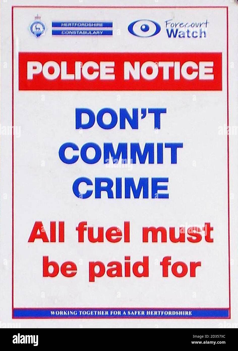Undated photo of a 'Police Notice' sign at petrol station in Beford, Hertfordshire. Stock Photo