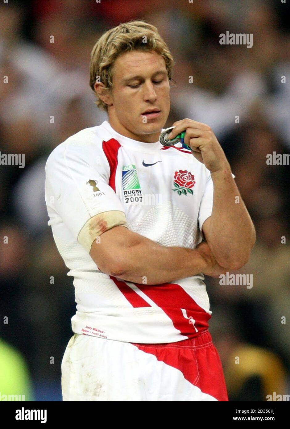 England's Jonny Wilkinson looks at his losers medal after the IRB Rugby World Cup Final match at Stade de France, Saint Denis, France. Stock Photo