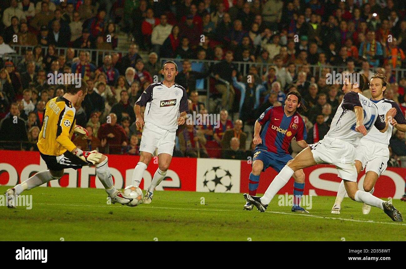Rangers goalkeeper Alan McGregor makes a save from Lionel Messi during ...