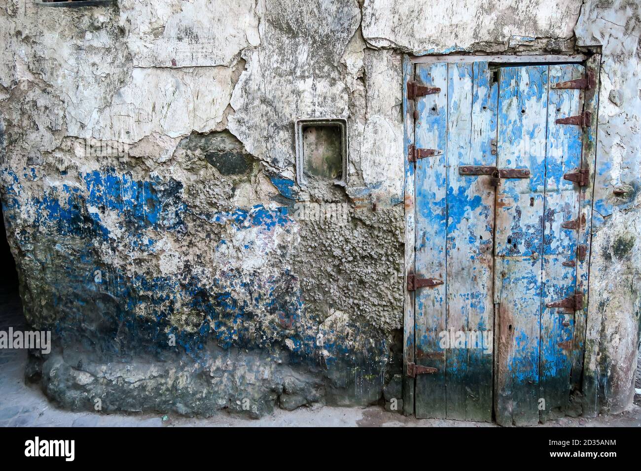 old wall with peeling paint, photo as background Stock Photo - Alamy