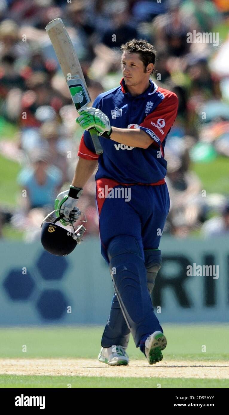 England's Phil Mustard raises his bat after scoring 50 runs during the Fourth One Day International match at McLean Park, Napier, New Zealand. Stock Photo