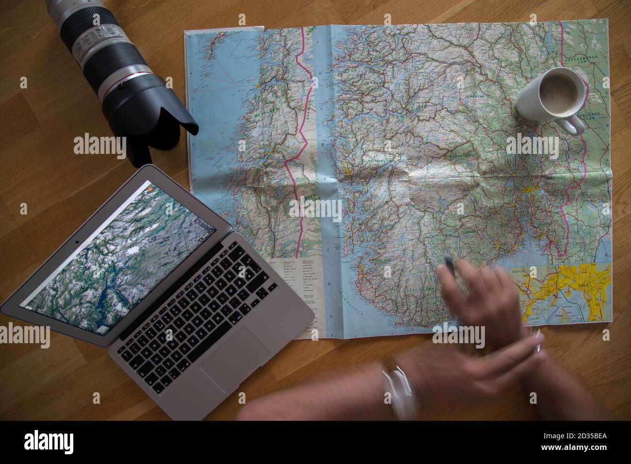 Planning a trip laptop map hi-res stock photography and images - Alamy