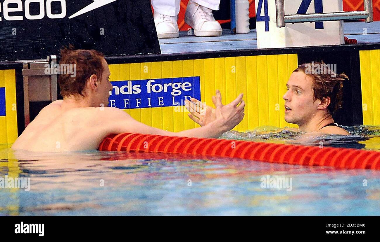 Thomas Haffield (right) is congratulated by Joseph Roebuck after his victory in the Mens Open 400m IM during the British Swimming Championships at Ponds Forge, Sheffield. Stock Photo