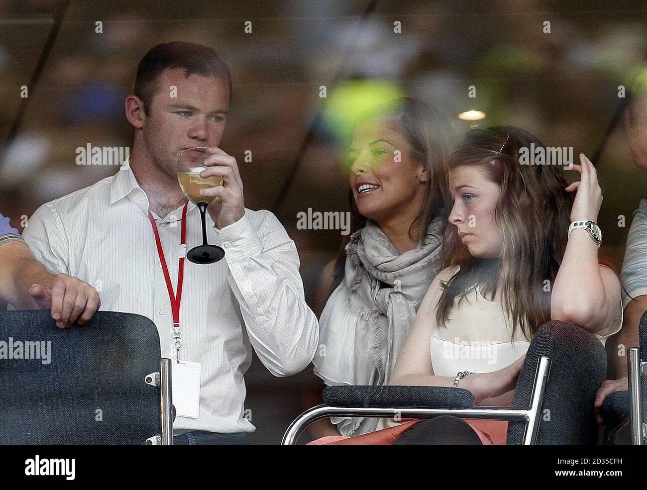 Wayne Rooney and Coleen McLoughlin (second right) at Anfield Stadium, Liverpool during the Liverpool Sound Concert as part of the Capital of Culture celebrations. Stock Photo