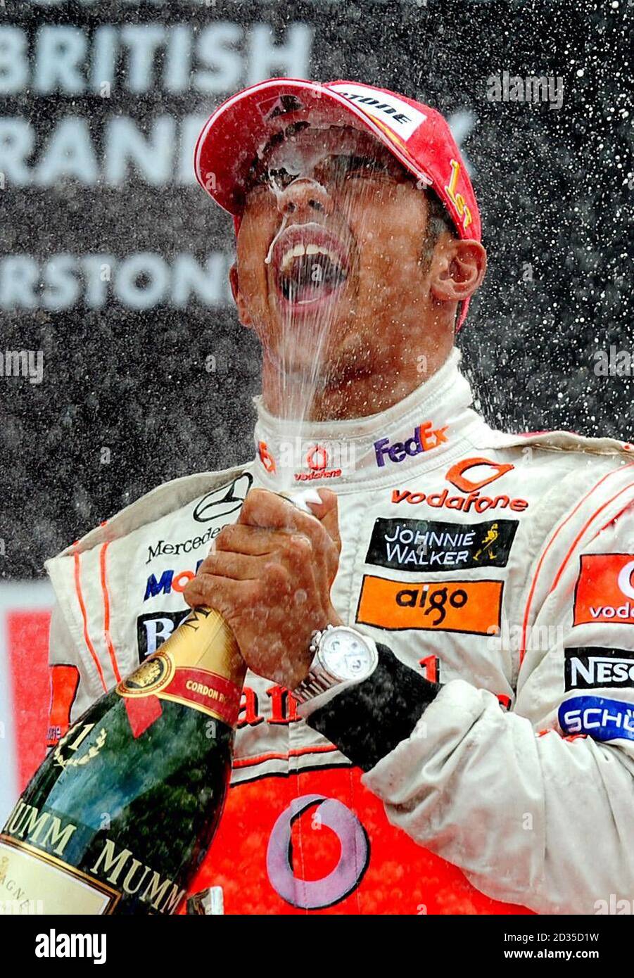 McLaren's Lewis Hamilton celebrates after winning the British Grand Prix at Silverstone, Northamptonshire. Stock Photo
