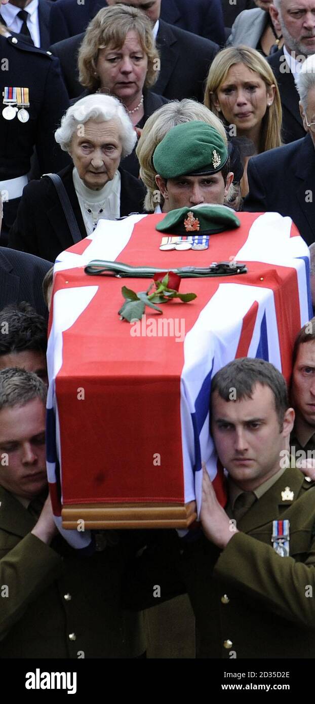 Cpl Carl Bryant follows the coffin of his wife Corporal Sarah Bryant, 26, at Holy Trinity Church, in Wetheral, near Carlisle, Cumbria. Stock Photo