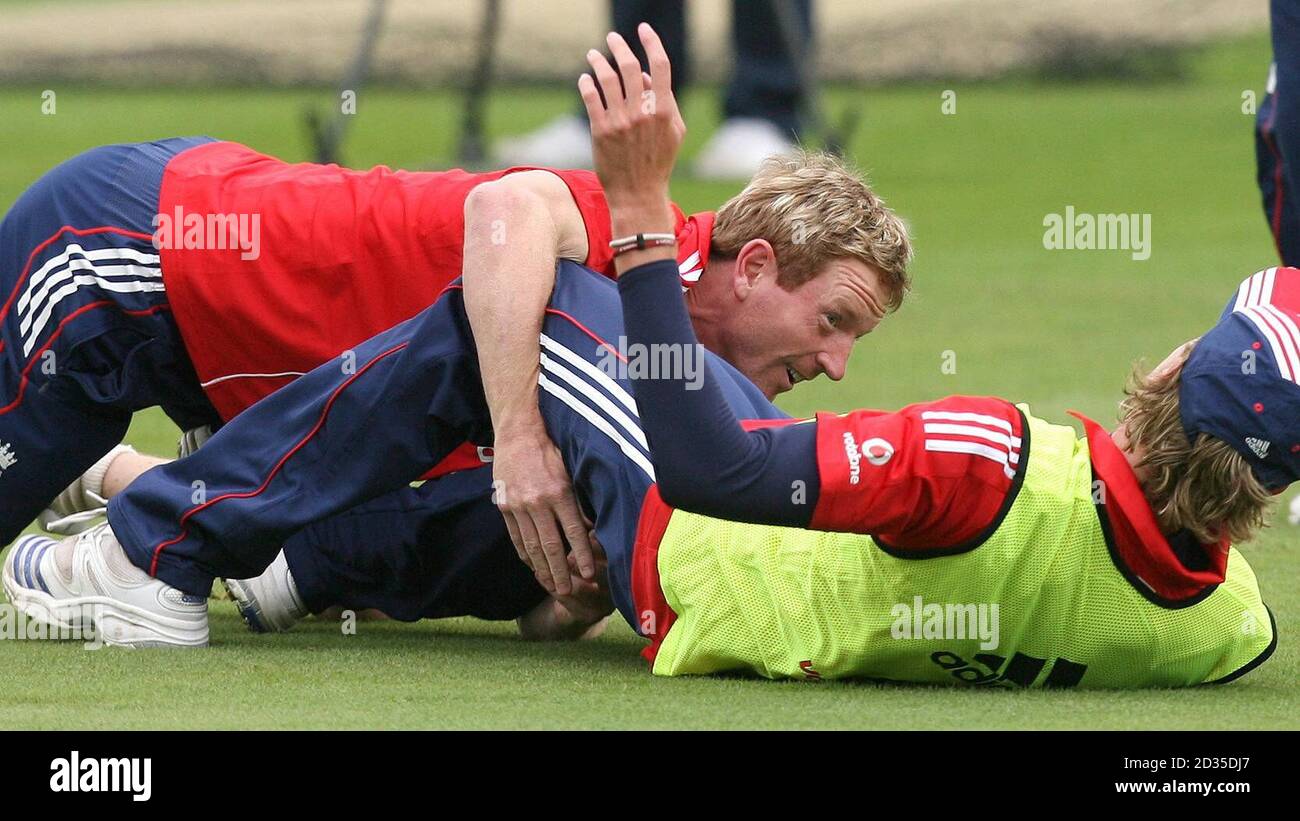 England's Paul Collingwood (left) tackles Stuart Broad during a game of touch rugby during a nets practice session at Trent Bridge, Nottingham. Stock Photo