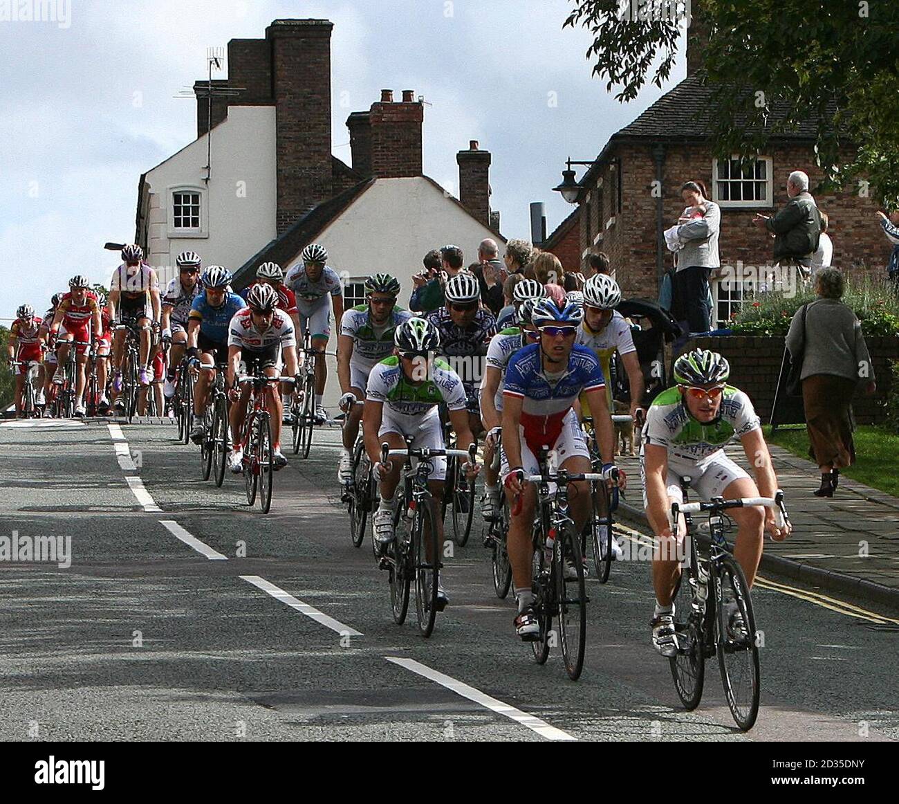 Tour Of Britain riders make their way through Ironbridge during Stage Four of the Tour. Stock Photo