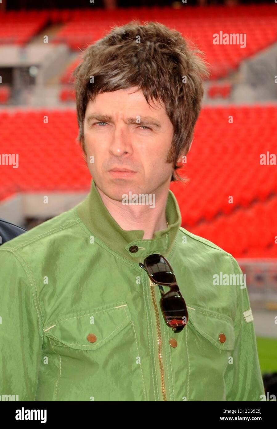 Oasis band member Noel Gallagher is pictured during a photocall at Wembley Stadium, where the band announced their biggest ever tour of open air venues in the UK and Ireland next summer. Stock Photo