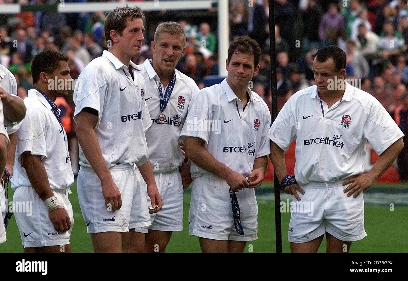 (L-R) Dejection for England's Jason Robinson, Will Greenwood, Lewis Moody, Kyran Bracken and Austin Healey after their defeat by Ireland cost England the Grand Slam Stock Photo