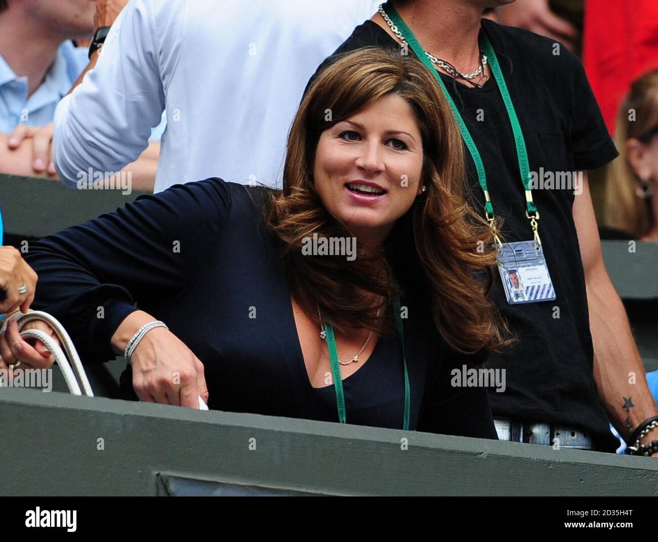 Mirka Vacrinec, watches her husband Roger Federer in action during the Wimbledon Championships at the All England Lawn Tennis and Croquet Club, Wimbledon, London. Stock Photo