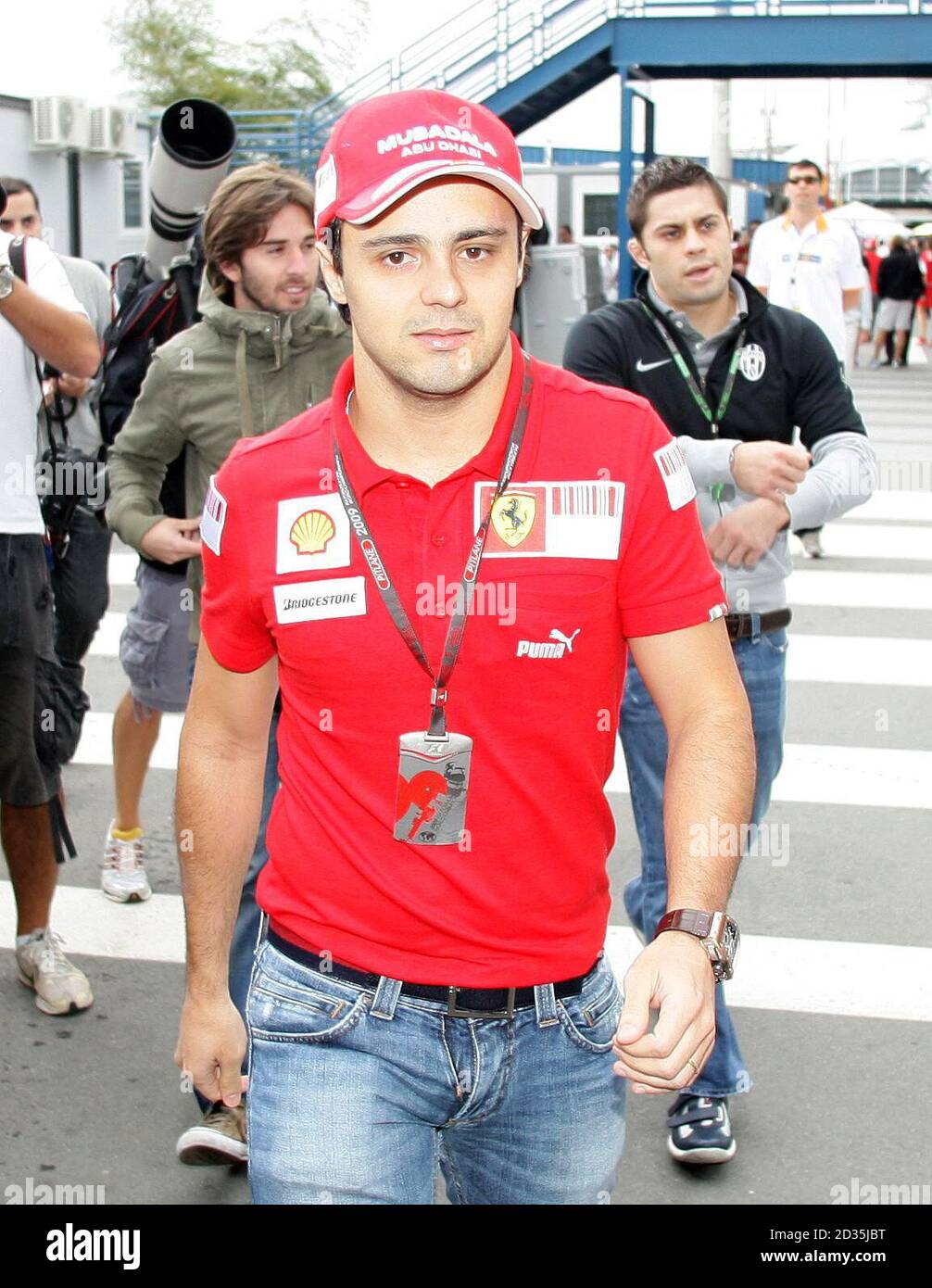 Ferrari s Felipe Massa arrives at the Interlagos track for the Practice day at Interlagos Sao Paulo. It is the first time he has entered the paddock since his crash at the Hungarian