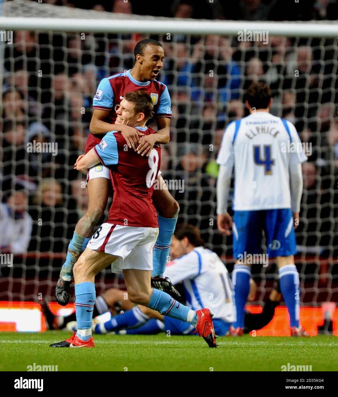 Aston Villa's Fabian Delph celebrates his goal with James Milner during the FA Cup Fouth Round match at Villa Park, Birmingham. Stock Photo