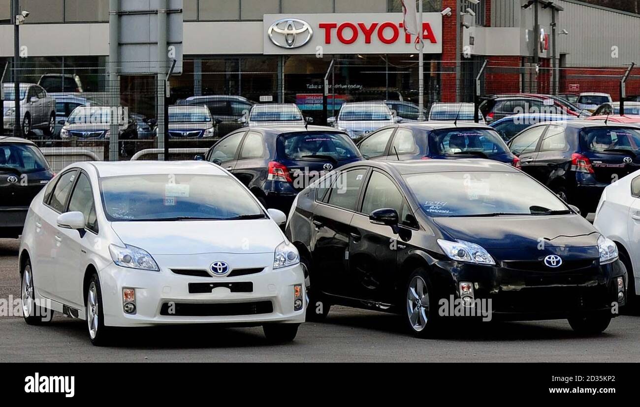 Toyota Prius hybrid cars inside a compound near a Toyota showroom in Burton on Trent, Staffordshire. Stock Photo