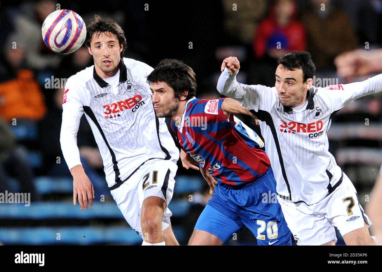 Swansea's Fede Bessone (left), Crystal Palace's Danny Butterfield and Swansea's Leon Britton (right) in action during the Coca-Cola Championship match at Selhurst Park, London. Stock Photo
