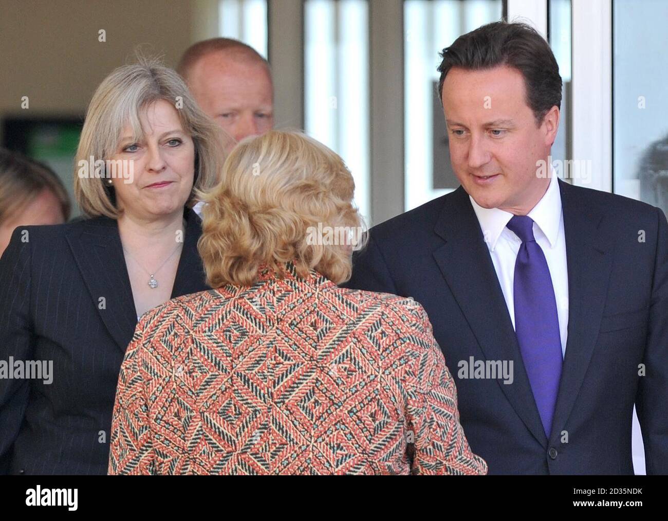 Prime Minister David Cameron and Home Secretary Theresa May leave the West Cumberland Hospital, Whitehaven, Cumbria. The Prime Minister visited Cumbria today to meet survivors and emergency services staff caught up in Derrick Bird's shooting rampage. Stock Photo