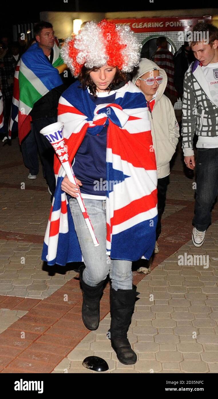 A fan leaves the Royal Bafokeng Stadium in Rustenburg following England ...