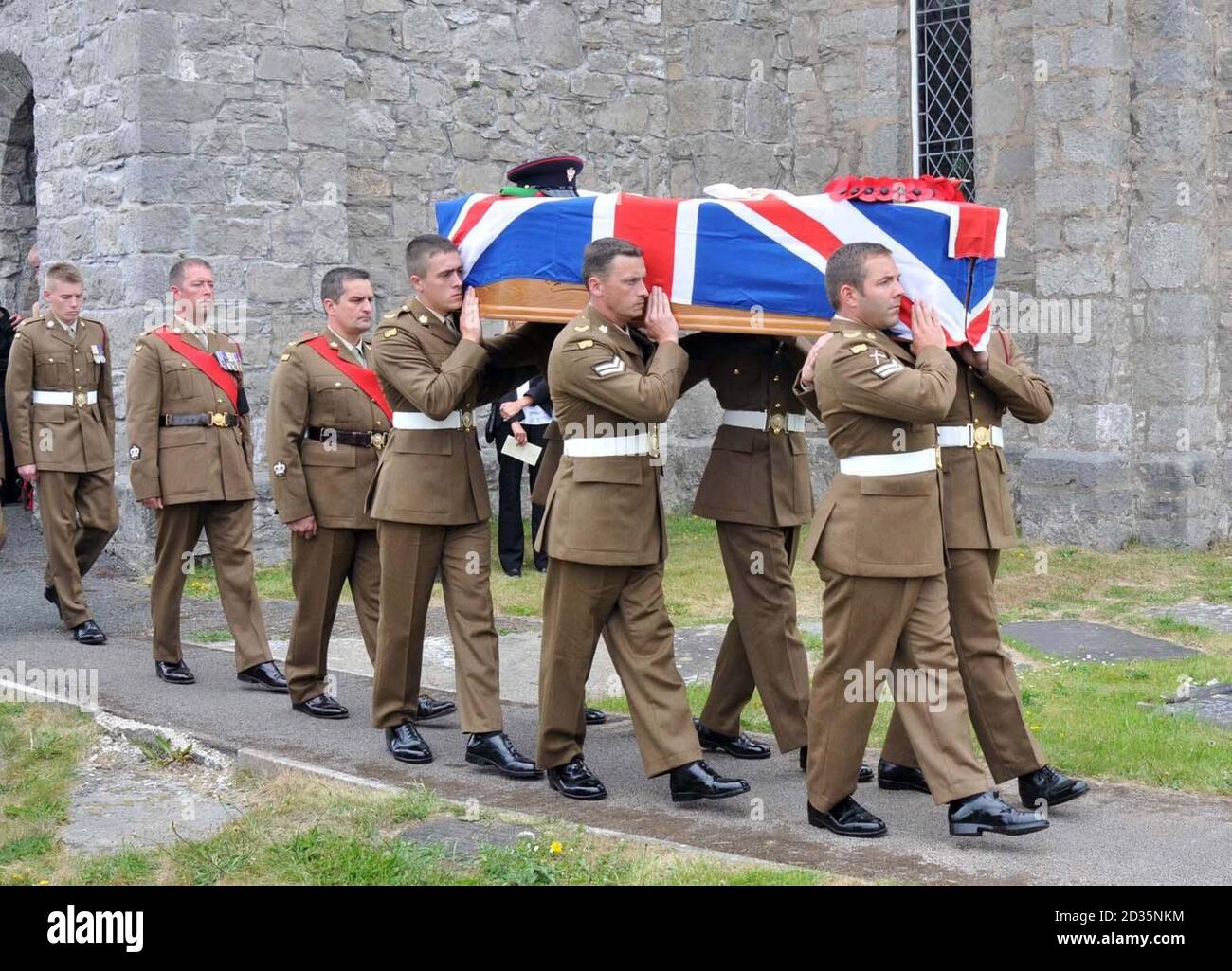 The coffin of Lance Corporal Alan Cochran leaves St Mary's Church in Ysceifiog, North Wales, following his funeral. Stock Photo