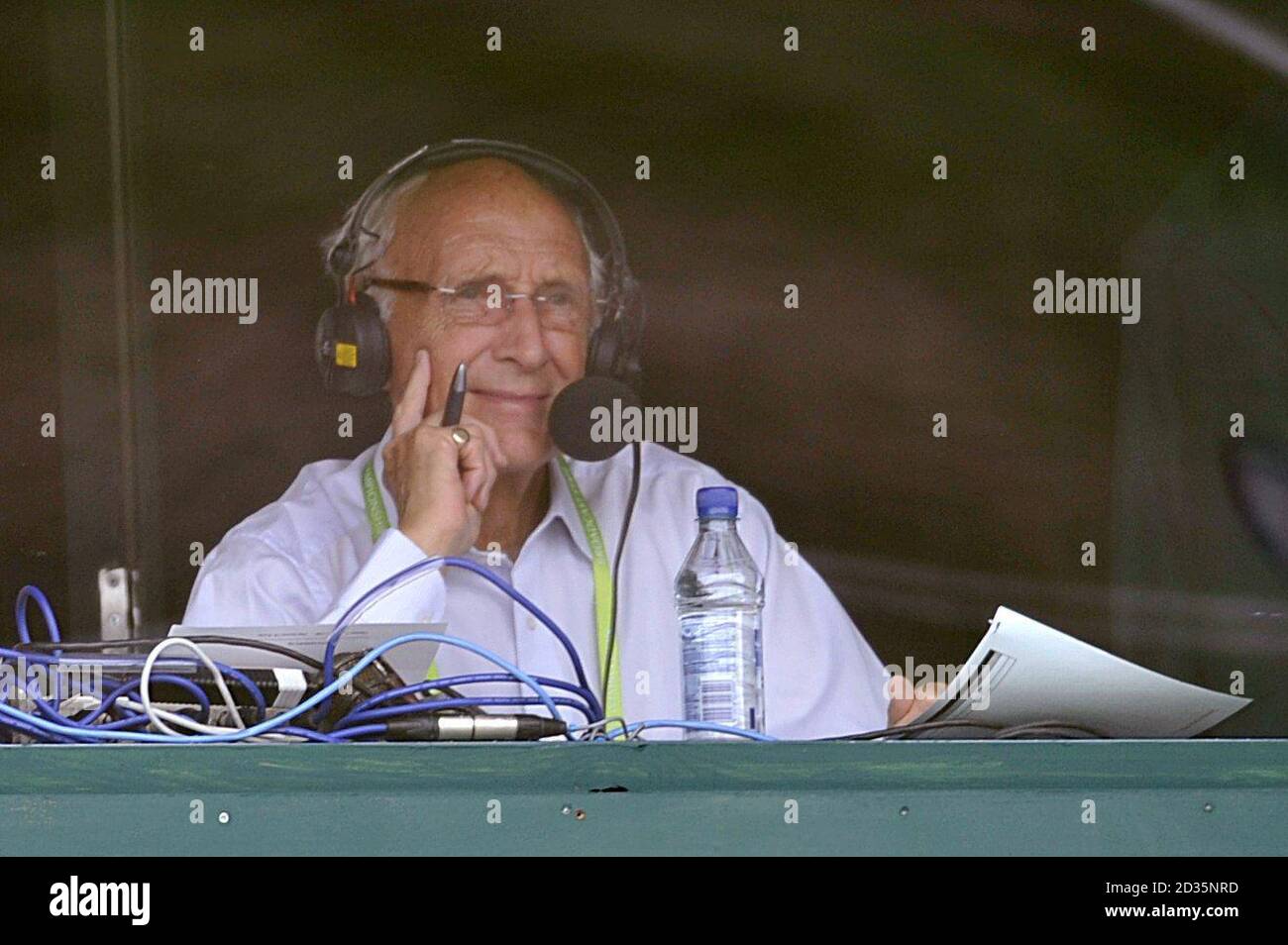 BBC commentator Barry Davies in the commentary box on court 12 during the match between Great Britain's Laura Robson and Great Britain's Tina Moore Stock Photo