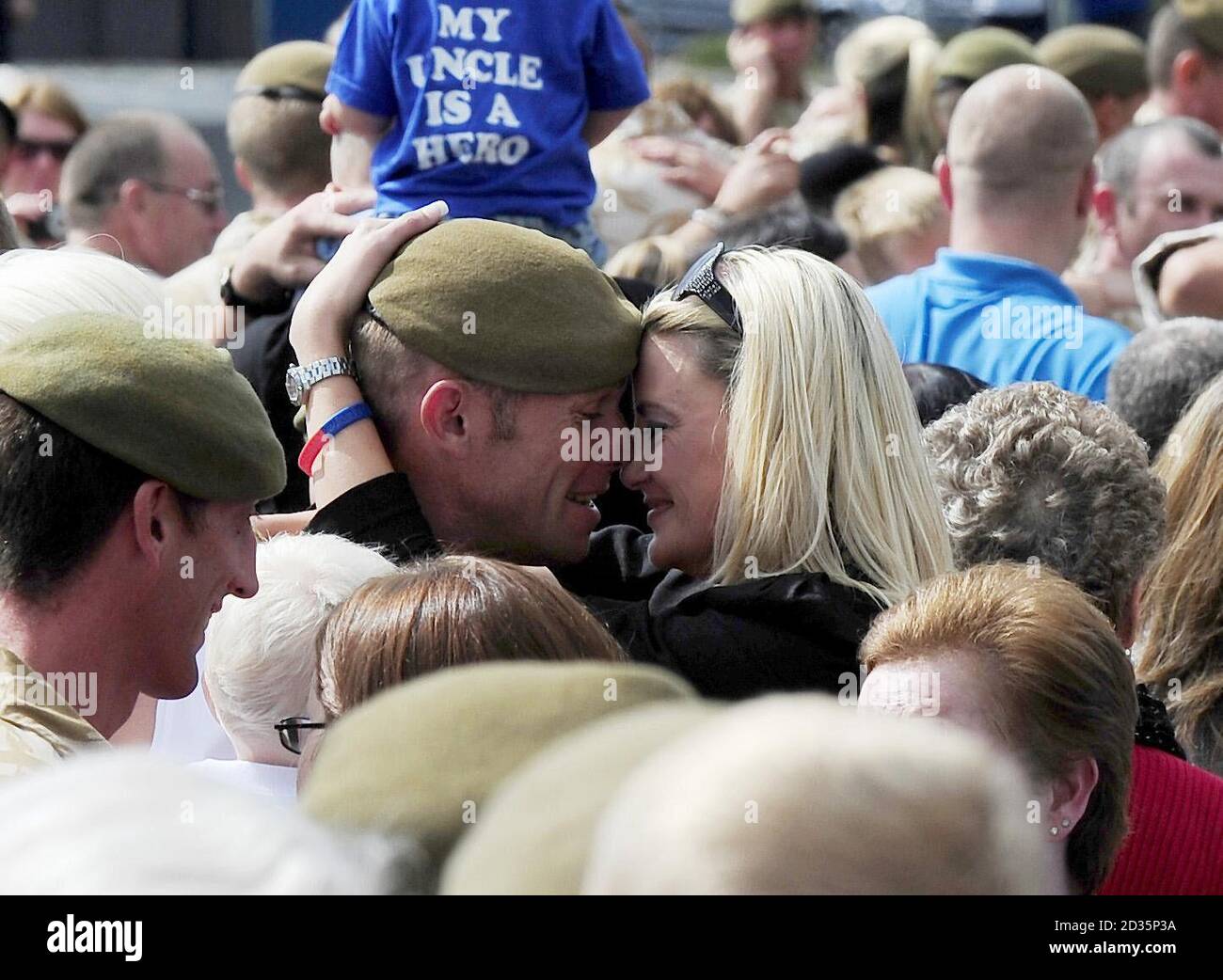 Soldiers from the 1st Battalion Scots Guard Right Flank are reunited with their families in Catterick Garrison, North Yorkshire today after a tour in Afghanistan. Stock Photo