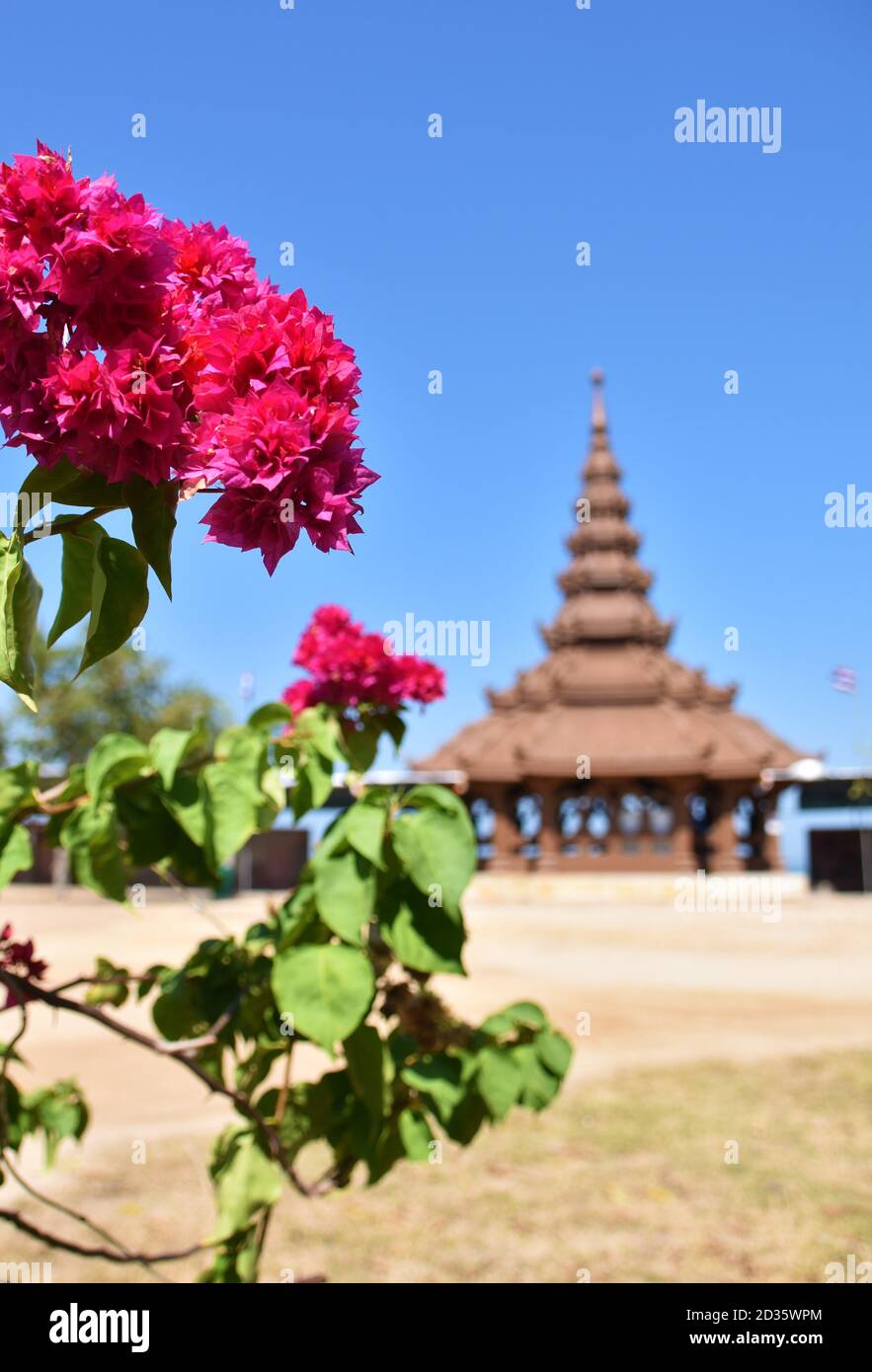 Flowers in front of a temple in Thailand Sanctuary of Truth Pattaya Stock Photo