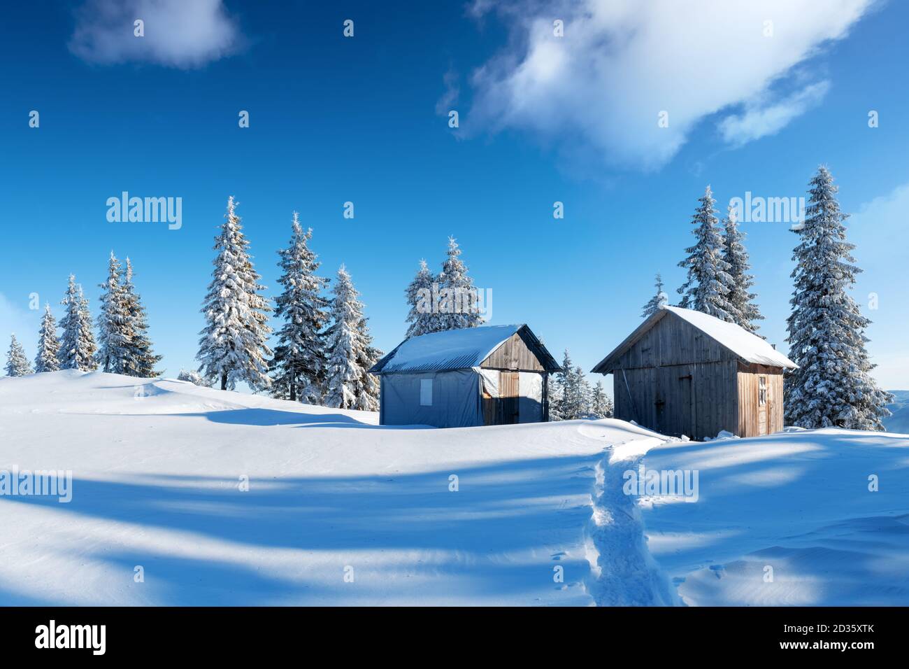 Fantastic Winter Landscape With Wooden House In Snowy Mountains Hight