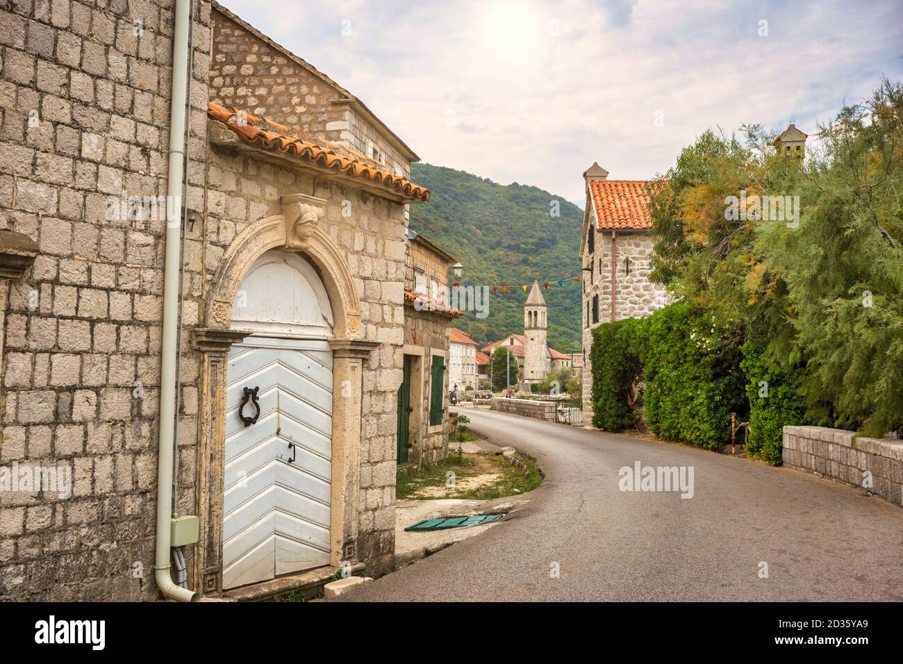 Old traditional mediterranean stone houses in the Bay of Kotor (Boka Kotorska), Montenegro, Europe. Travel concept, background. Stock Photo