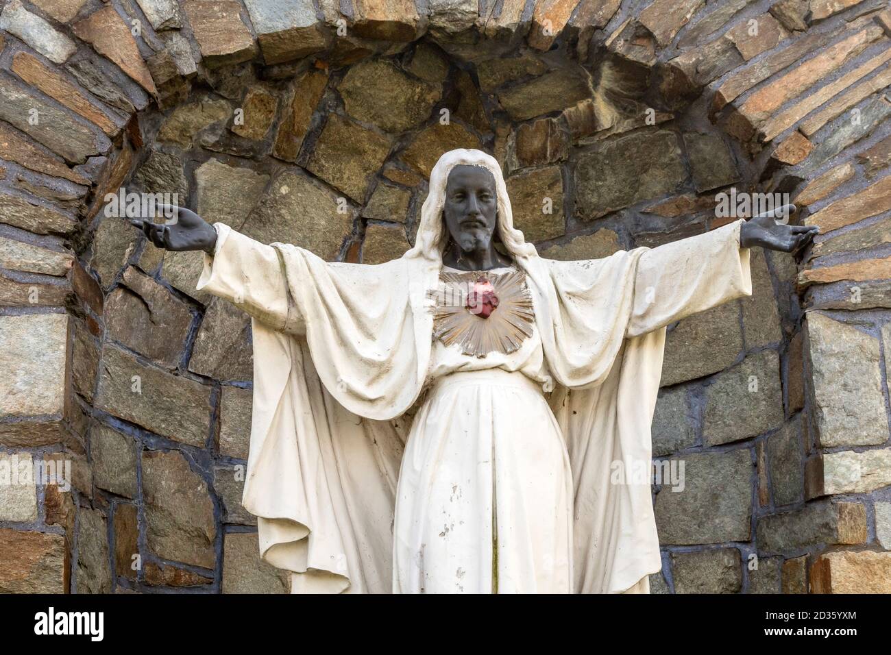 Detroit, Michigan - A statue of a black Jesus at Sacred Heart Major Seminary. Made of white stone in 1957, the statue's face, hands, and feet were pai Stock Photo