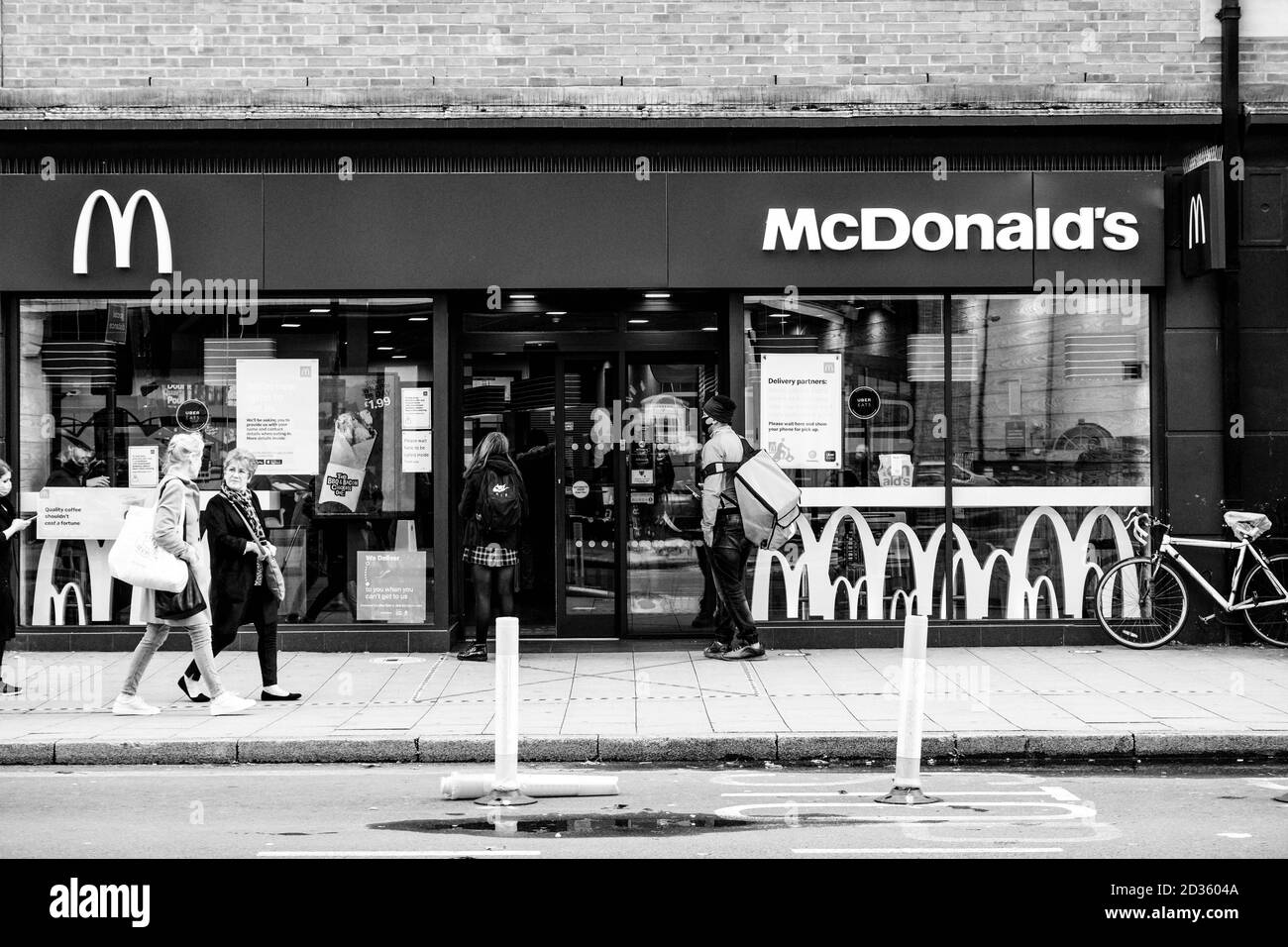 London UK October 06 2020, People Walking Past A McDonalds Fast Food Resaurant During COVID-19 Stock Photo
