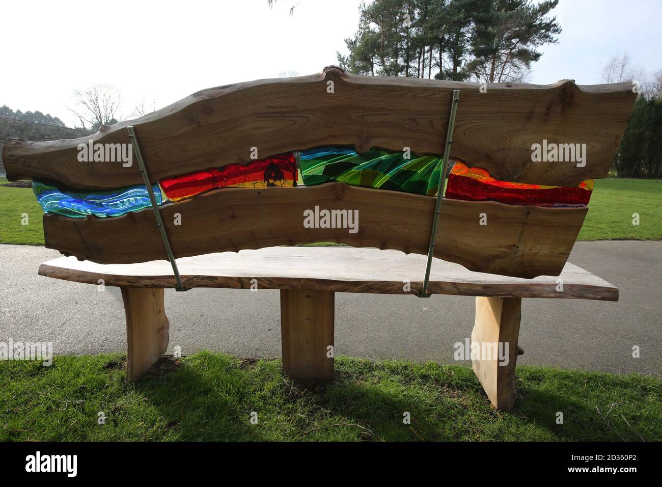 Scotland,Ayrshire,Alloway,Hand crafted bench with stained glass inserts