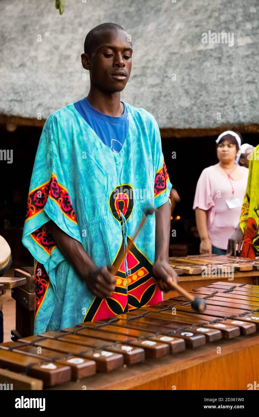 Johannesburg, South Africa - December 9, 2012: African Men playing traditional drums for tourists Stock Photo