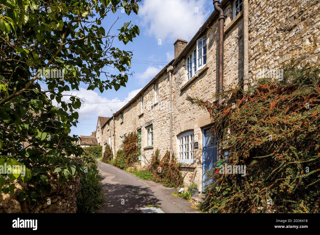 A row of stone cottages in the Cotswold village of Bisley, Gloucestershire UK Stock Photo